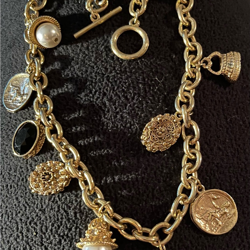 Beautiful Vintage Goldtone Victorian Necklace with 9 Watch fob charms. 19” long.